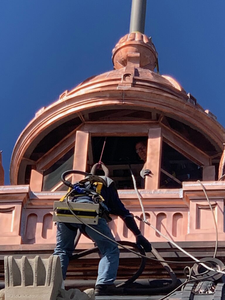 During sandblasting the Brown County copper dome.