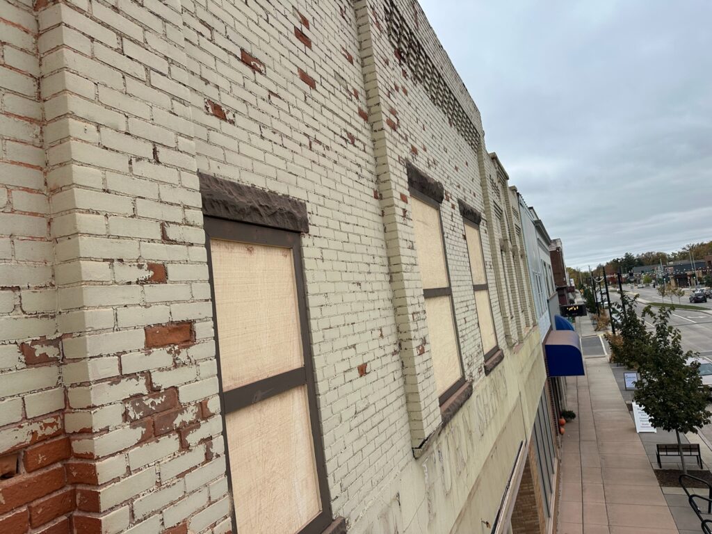 Before sandblasting on old brick building Before sandblasting on old brick building