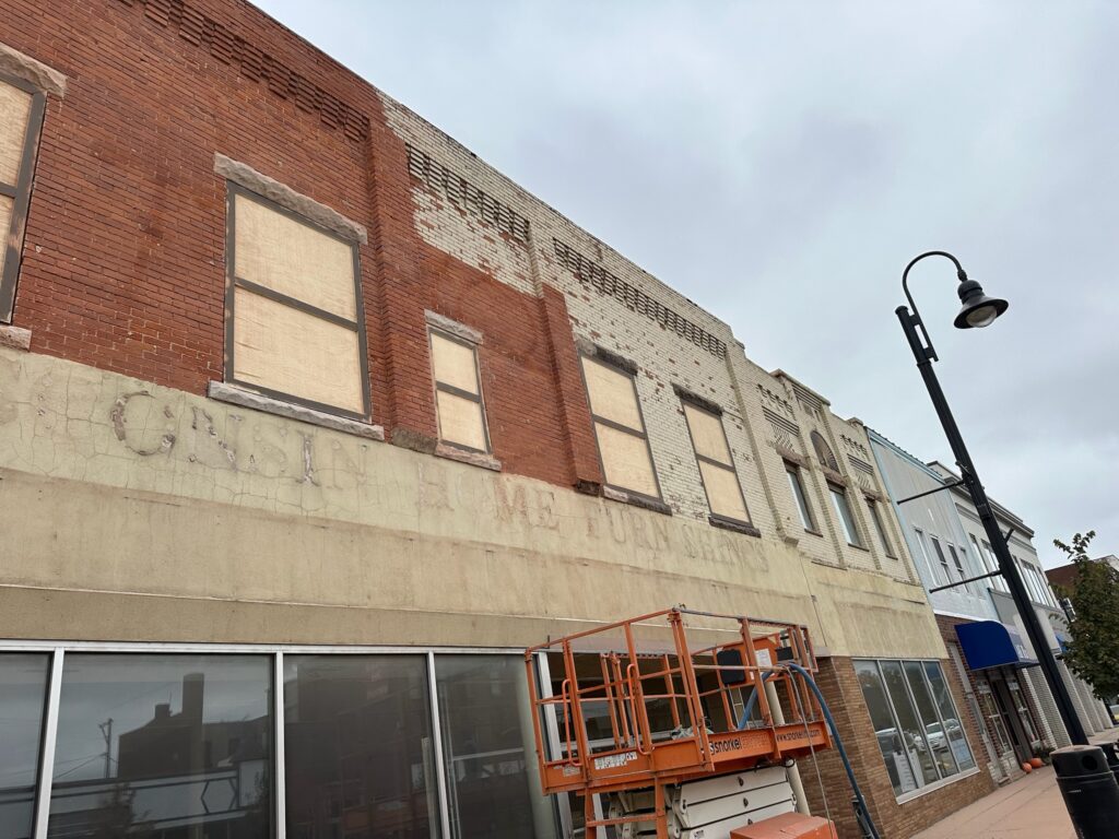 During sandblasting on old brick building During sandblasting on old brick building