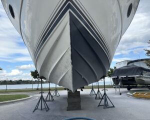 a boat hull half salt blasted